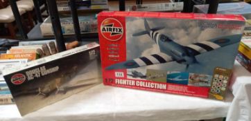 A boxed airfix A50065, 05020, Spitfire and Douglas AC- 47, gunship. Both used, Douglas sealed. scale