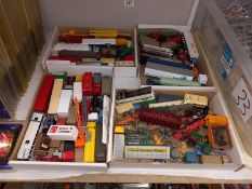 4 trays of mainly plastic H0/00 gauge cars and commercial vehicles