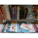 A large lot of vintage Punch books and magazines