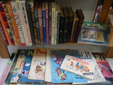 A large lot of vintage Punch books and magazines