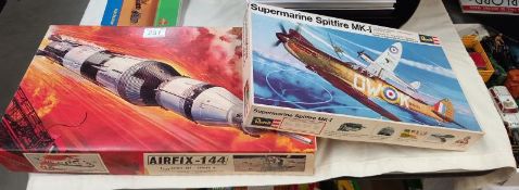 A Revell Spitfire H-282, 1:32 scale, An Airfix - 144, 1:144 scale, series 9 & an Apollo Saturn,