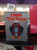 A 1000 tin toys a rare book on tin plate with 1000 colour pictures, printed 1996