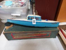 A pre-war Hornby speedboat no4 venture with key. In original box