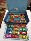 A vintage Matchbox carry case and contents