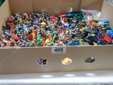 A large collection of vintage plastic figures including Cowboys etc.