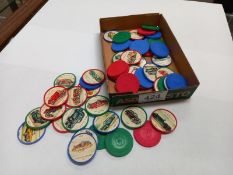 A quantity of vintage Sparkies from spar vintage car plastic tokens