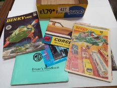 A quantity of 1960/70's Dinky Corgi Matchbox catalogues and a MG, MGB driver's handbook