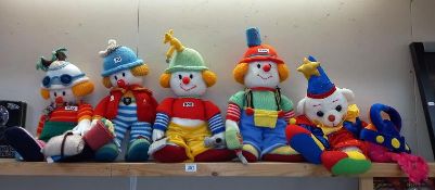 4 large knitted clowns and a clown teddy bear