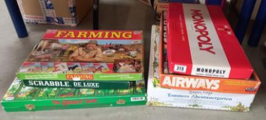 A good selection of games including Monopoly, farming game sealed, others, completeness unknown