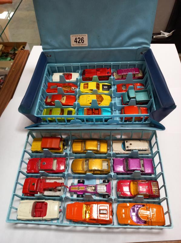 A vintage Matchbox carry case and contents