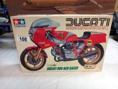 A boxed Tamiya Ducati 900 NCR racer kit no 1422. Looks complete, 1:12 scale