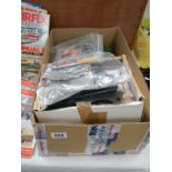 A box of model railway layout, trees, buildings and other accessories