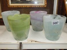 4 recycled glass orchid pots.