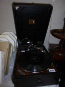 An HMV wind up picnic gramaphone.