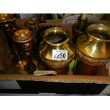 A mixed lot of brass ware including candlesticks, vases etc.,