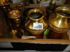 A mixed lot of brass ware including candlesticks, vases etc.,
