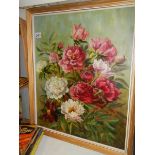 A mid 20th century oil on board painting of flowers.