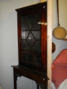 A Victorian mahogany astragal glazed corner cabinet on stand. COLLECT ONLY.