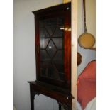 A Victorian mahogany astragal glazed corner cabinet on stand. COLLECT ONLY.