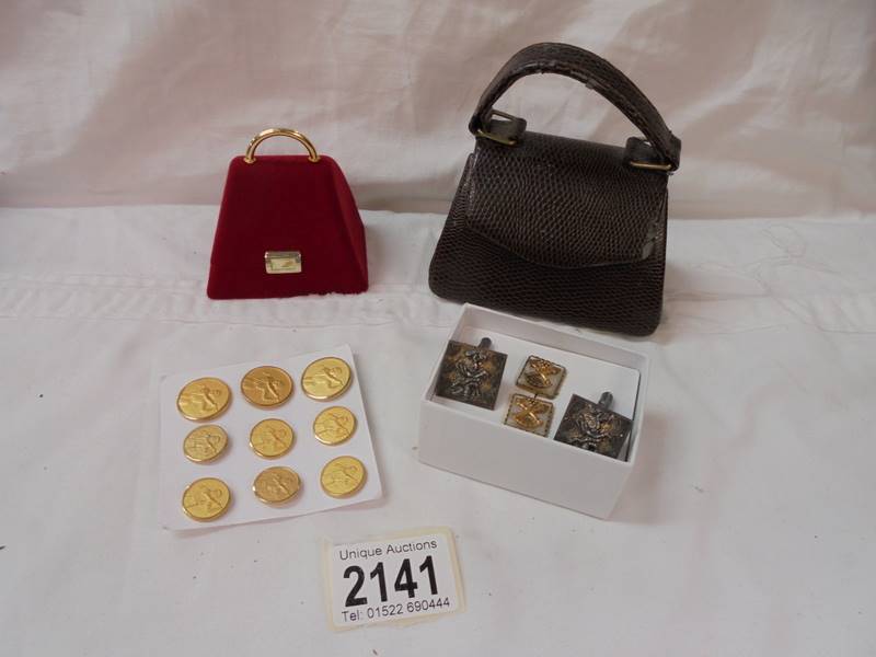 A mixed lot including button's, cuff links, miniature hand bag.