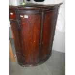 A Victorian carved oak corner cupboard. COLLECT ONLY.