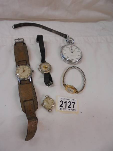 A quantity of wrist watches and a pocket watch.