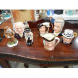 Seven character jugs including Doulton.