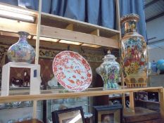 A tall Chinese vase, a Chinese ginger jar, a Chinese plate and another Chinese vase, COLLECT ONLY.