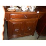 A Chinese style mahogany cabinet. COLLECT ONLY.