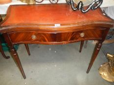 A mahogany fold over games table with leather top, COLLECT ONLY