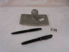 A vintage blotter, an Osmiroid 65 and a Platinum Regal fountain pens.