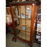 An oak mid 20th century display cabinet. COLLECT ONLY.