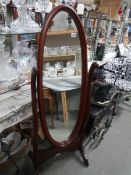 A good quality oval mahogany cheval mirror. COLLECT ONLY.