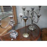 A candelabra and a candlestick.