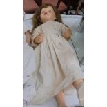 A vintage walking doll.