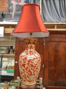 A hand painted table lamp.