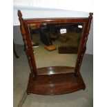 A mahogany swivel toilet mirror. COLLECT ONLY.