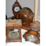A quantity of old clock parts.