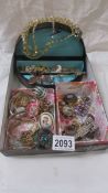 A mixed lot of costume jewellery, mainly brooches.