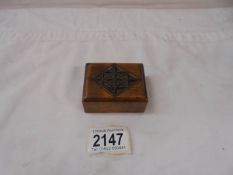 A small treen stamp box.