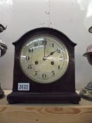 A mahogany 8 day mantel clock.