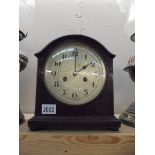 A mahogany 8 day mantel clock.