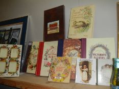 A quantity of old style photograph albums.
