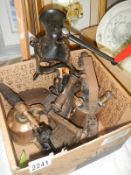 A good box of metal ware including blow lamps, irons etc.,