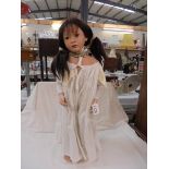A good quality porcelain collector's doll.