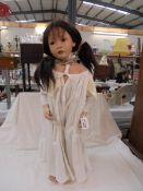 A good quality porcelain collector's doll.