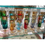 17 hand decorated coloured glasses.