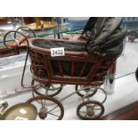 A vintage dolls pram. COLLECT ONLY.