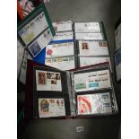 Five albums of first day covers.