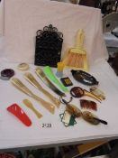 A mixed lot including letter rack, crumb tray with brush, shoe horns etc.,